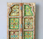 Hand-painted old Indian teak door with floral motifs in vintage style.
