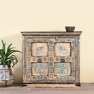Hand-painted cupboard made from reclaimed wood and old Indian doors – a sustainable furniture piece perfect for Indian home decor and rustic interiors.