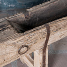 Close up picture of an antique console table wood repurposed from teak trough, ideal as an entryway table vintage statement.