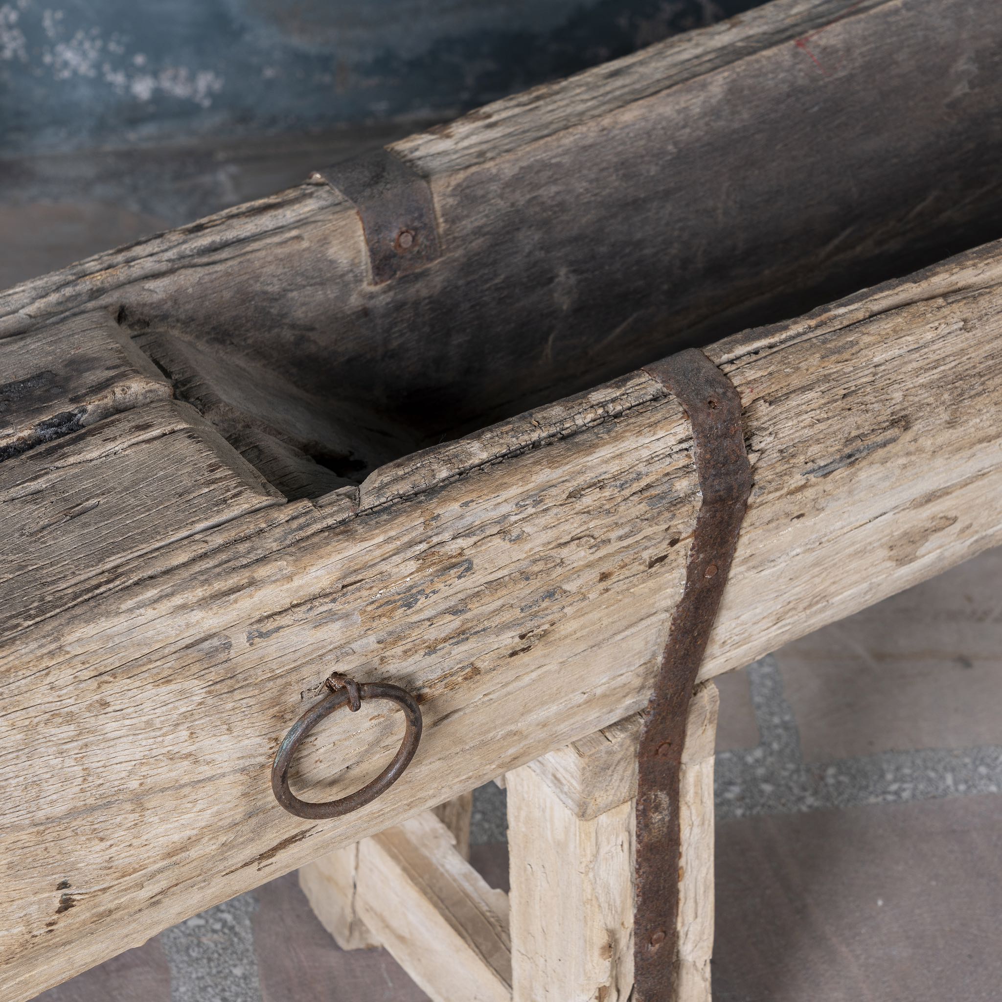 Close up picture of an antique console table wood repurposed from teak trough, ideal as an entryway table vintage statement.
