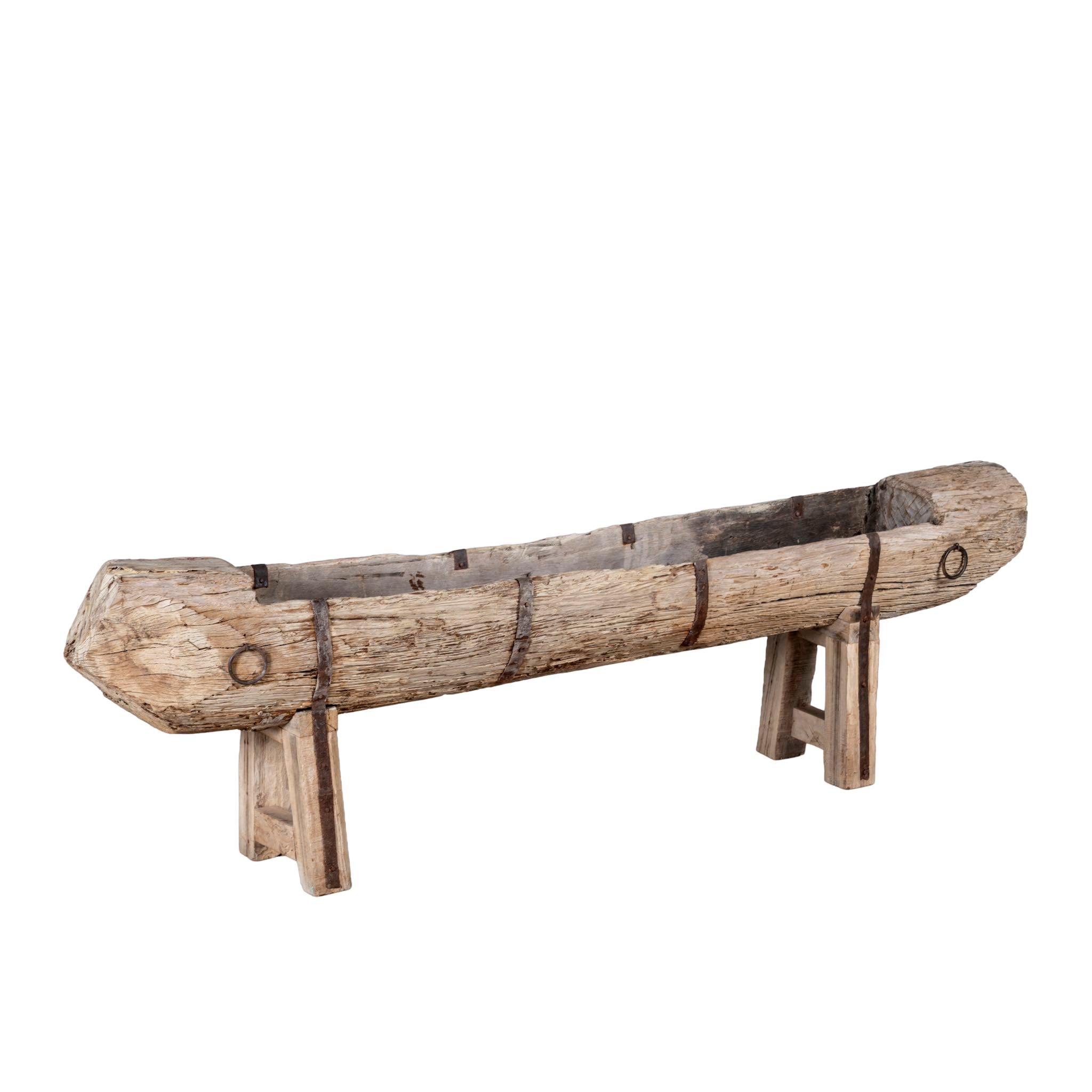 White background image of an antique console table wood repurposed from teak trough, ideal as an entryway table vintage statement.