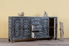 Side angle image with open doors of a Hand-painted black and white sideboard made of reclaimed wood – Kaira model by Om Home & Garden