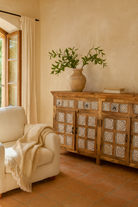Hand-carved mango wood sideboard with whitewashed floral details; perfect as living room furniture or mango wood furniture for vintage interiors, 180 × 100 × 40 cm.