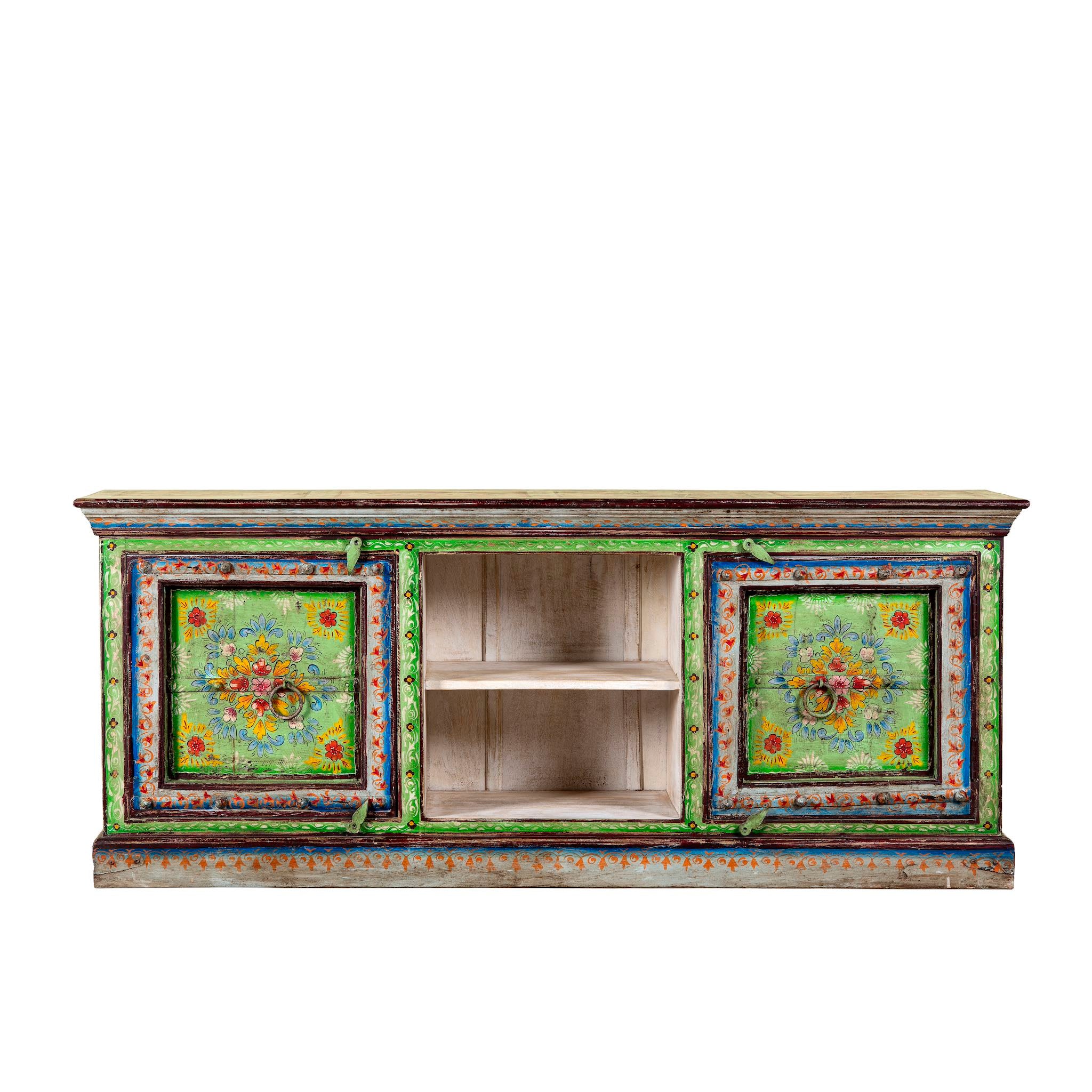 White background image of a hand-painted reclaimed wood vintage lowboard with floral motifs – a colourful piece of sustainable furniture for artistic and rustic interiors.