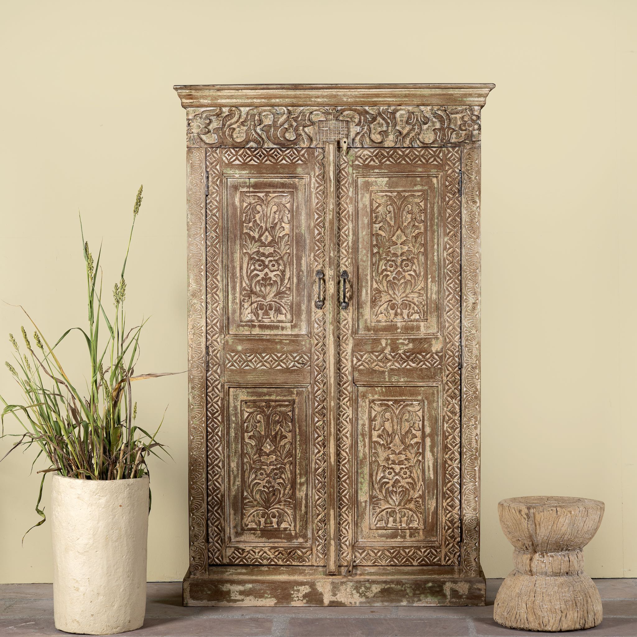 Hand-carved reclaimed wood wardrobe with vintage finish – a sustainable furniture piece ideal for Indian home decor and rustic interiors.