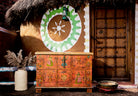 Recycled teak wood chest with hand-painted Indian motifs in orange – sustainable furniture with vibrant character and cultural craftsmanship.