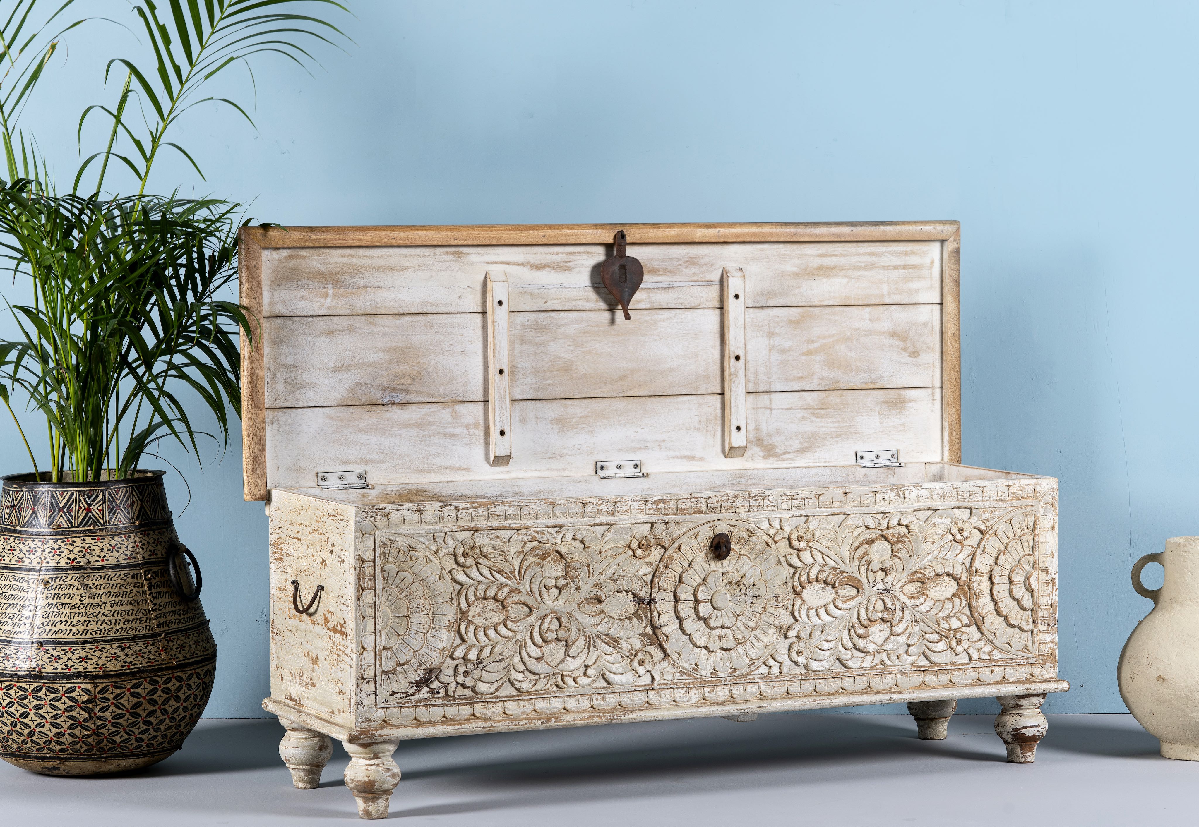 Storage box for living room furniture and bedroom furniture hand carved from India.