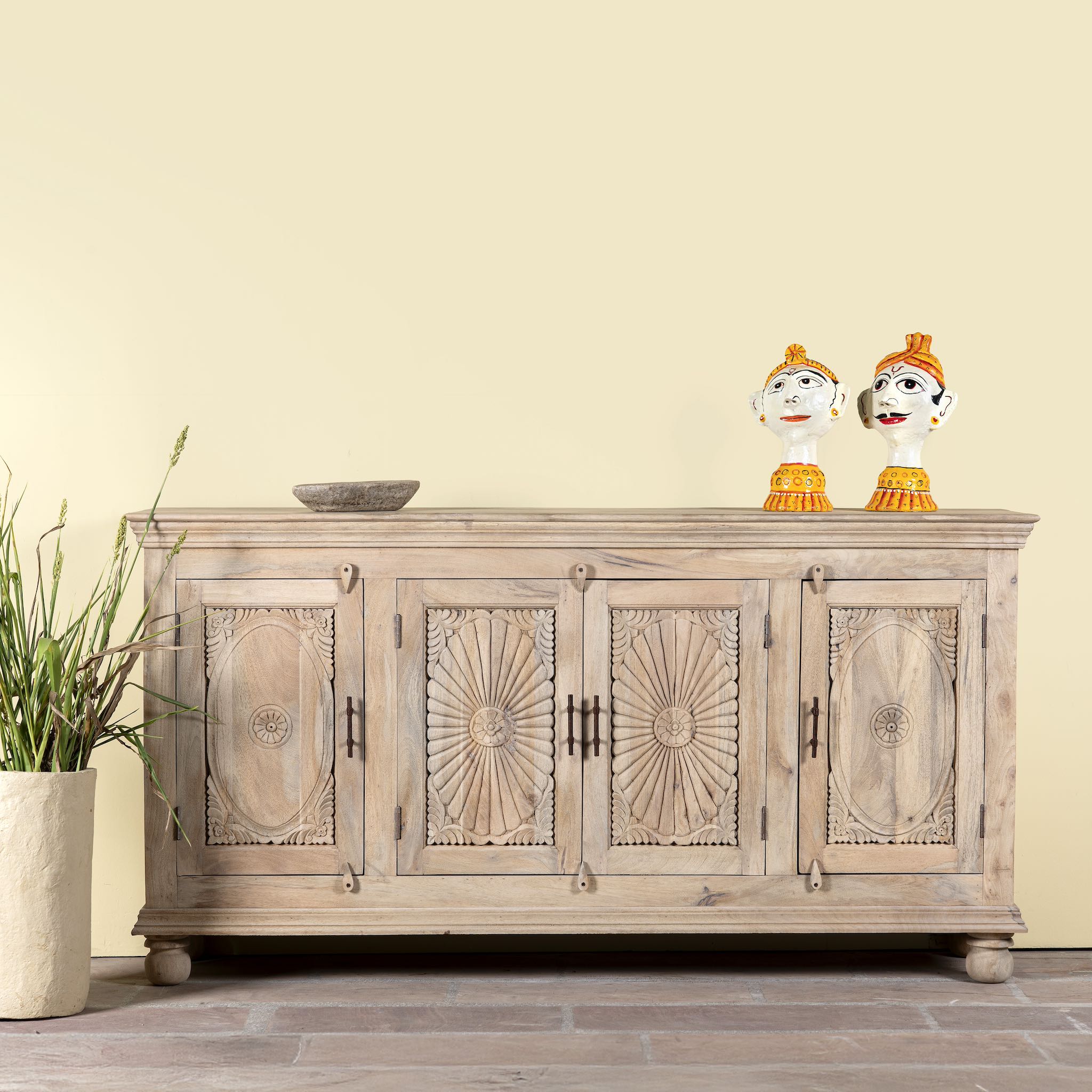 Hand-carved mango wood sideboard with sandblasted finish – a rustic mango wood furniture piece ideal for Ibiza style interiors.