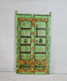 Hand-painted old Indian teak door with floral motifs in vintage style.