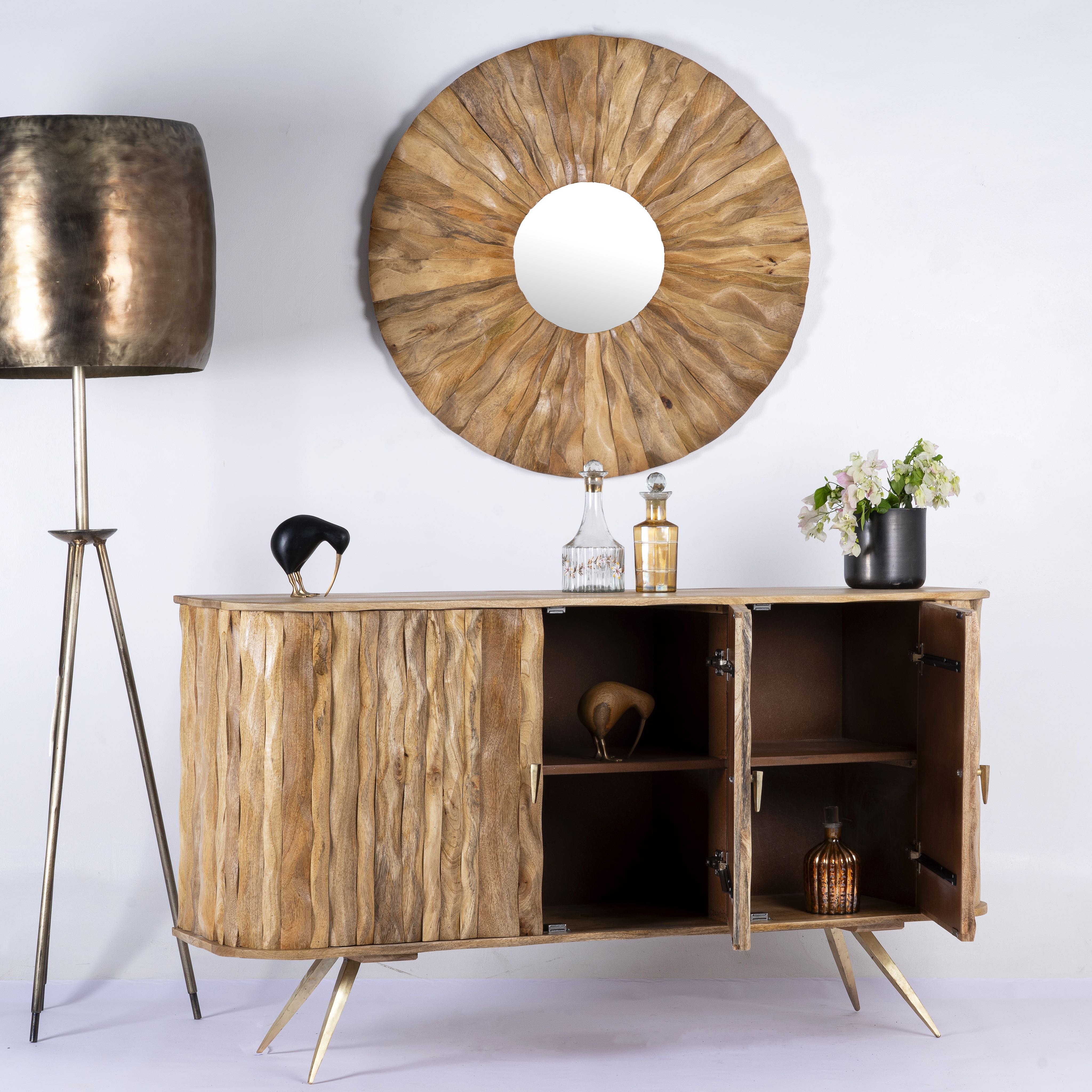Side angle image with open doors of a handmade mango wood sideboard with live-edge design, brass-coated base, and handles—an artisanal furniture piece combining natural and modern elements.