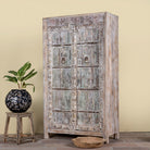 Side angle image of a reclaimed wood wardrobe made with antique door panels – a handcrafted piece of old door furniture perfect for Indian home decor and rustic interiors.