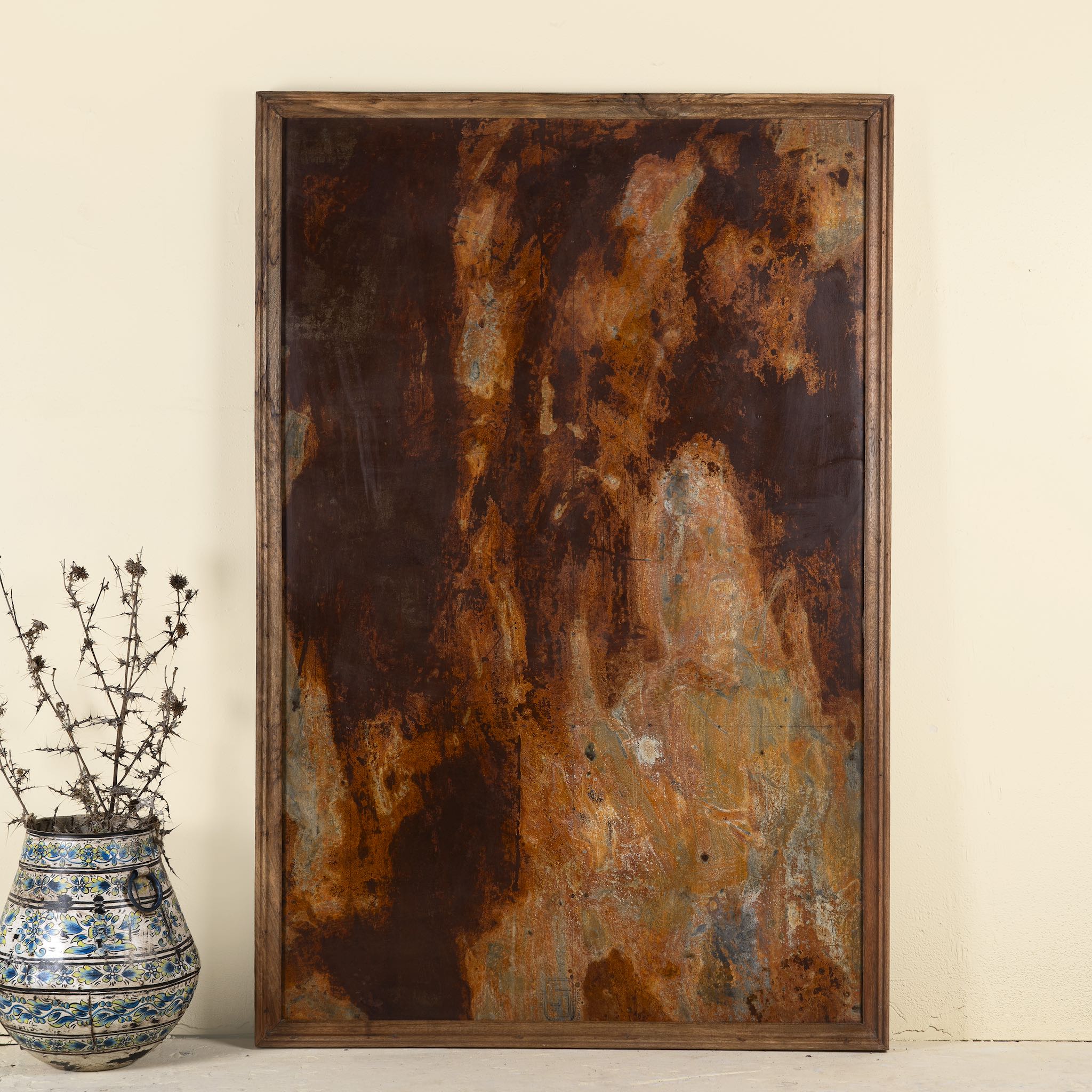 Rusted iron and teak wall panel, artisanal furniture piece, part of our Indian home decor collection.