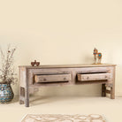 Open drawer image of a carved console table made from reclaimed teak, a refined example of unique wooden furniture.