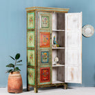 Side angle image with open doors of a hand-painted sustainable teak wood cabinet with floral motifs – Sangrur by Om Home & Garden, a one-of-a-kind piece of sustainable furniture with artistic expression.