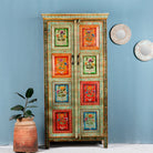 Hand-painted sustainable teak wood cabinet with floral motifs – Sangrur by Om Home & Garden, a one-of-a-kind piece of sustainable furniture with artistic expression.