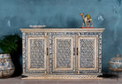 Hand-painted sideboard made from reclaimed wood in indigo and cream tones – a handcrafted piece of reclaimed wood furniture perfect for hand painted interiors.