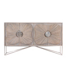 White background image of a handcrafted mango wood sideboard with floral-inspired sunburst carving, grey wash finish, and silver accents – mid century style furniture for elegant living spaces.