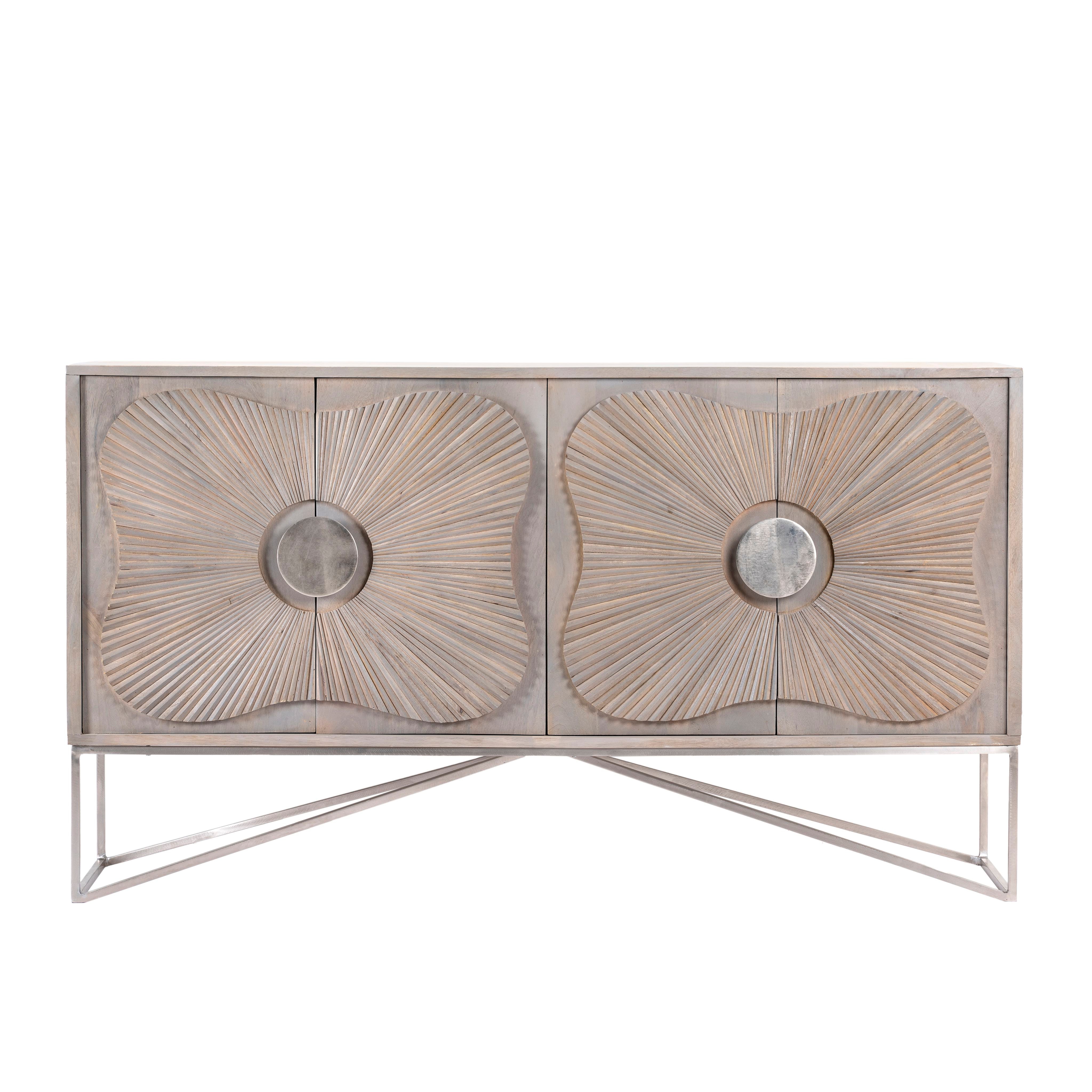 White background image of a handcrafted mango wood sideboard with floral-inspired sunburst carving, grey wash finish, and silver accents – mid century style furniture for elegant living spaces.