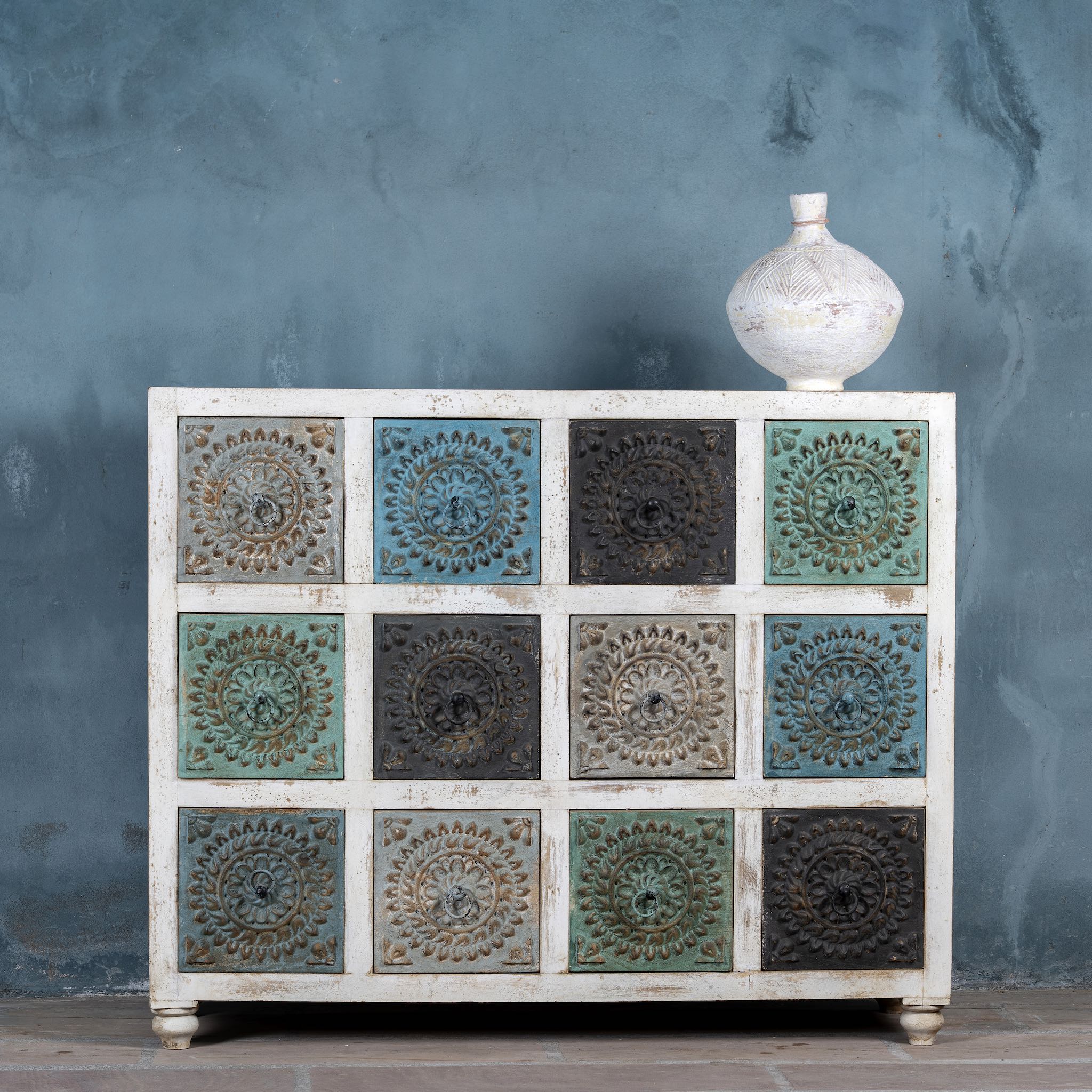 Hand-carved chest of drawers Tanika, solid mango wood with multicolour floral motifs, eclectic bohemian vintage design, 124 × 40 × 102 cm.


