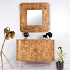 Handmade teak wood cabinet with chevron pattern, brass stand, and handles—minimalistic style living room furniture with modern and natural appeal.