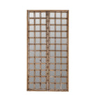 White background picture of a wooden door mirror with antique teak frame and carvings, part of our Indian home decor collection.