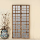 Wooden door mirror with antique teak frame and carvings, part of our Indian home decor collection.