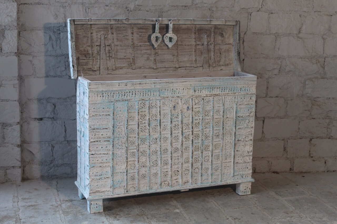 Side angle image of a antique Indian chest in blue with brass fittings – solid teak iron fitted wooden chest ideal for storing blankets, pillows, or decorative use.