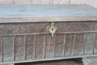 Close up image of a antique Indian chest coffee table in blue with brass fittings – iron fitted wooden chest made from solid teak, ideal for living rooms with storage space.