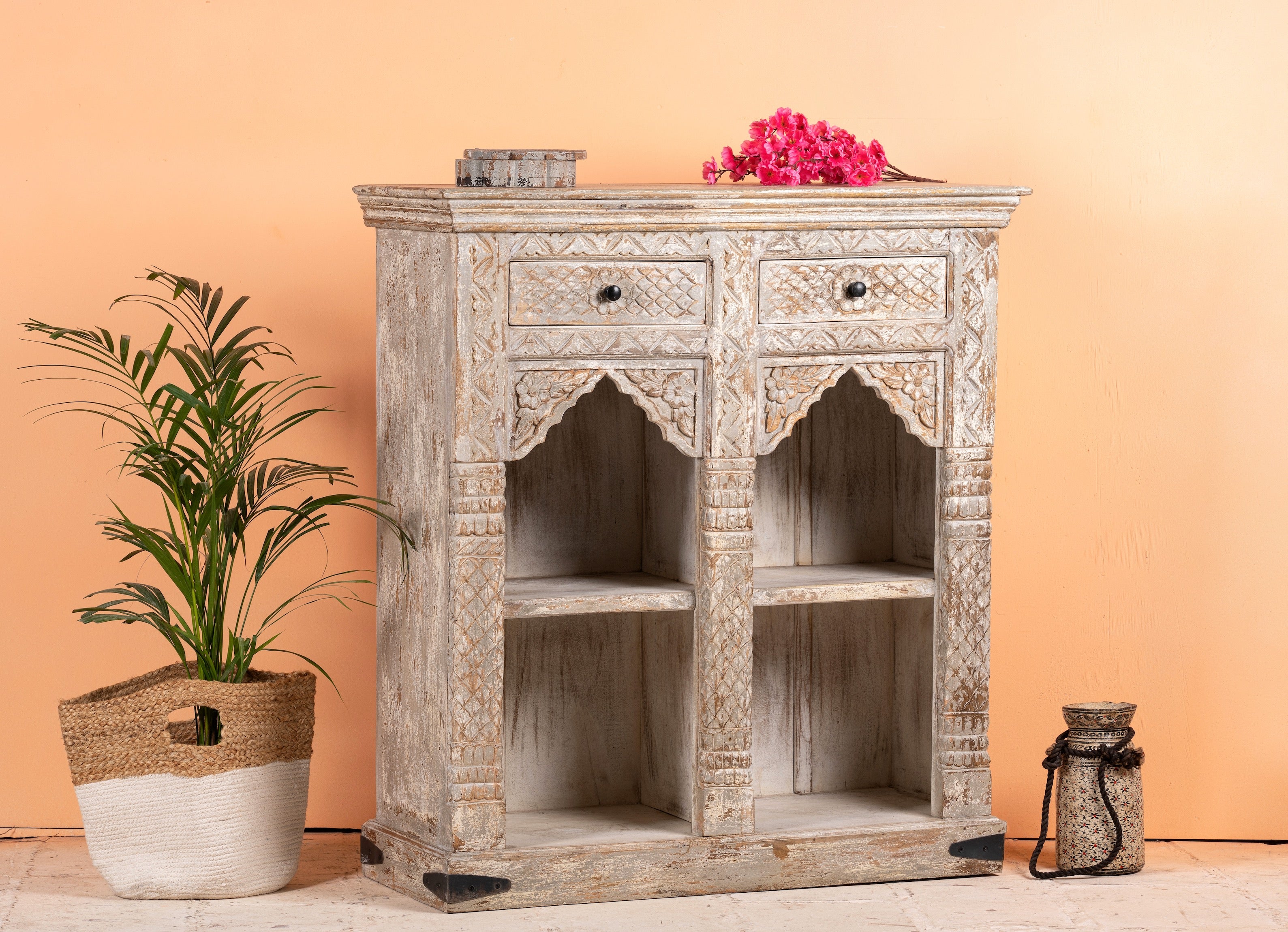 Side angle image of a handcrafted mango wood shelving unit with balanced square design – vintage home accessories display shelf with natural wood finish and artistic expression.