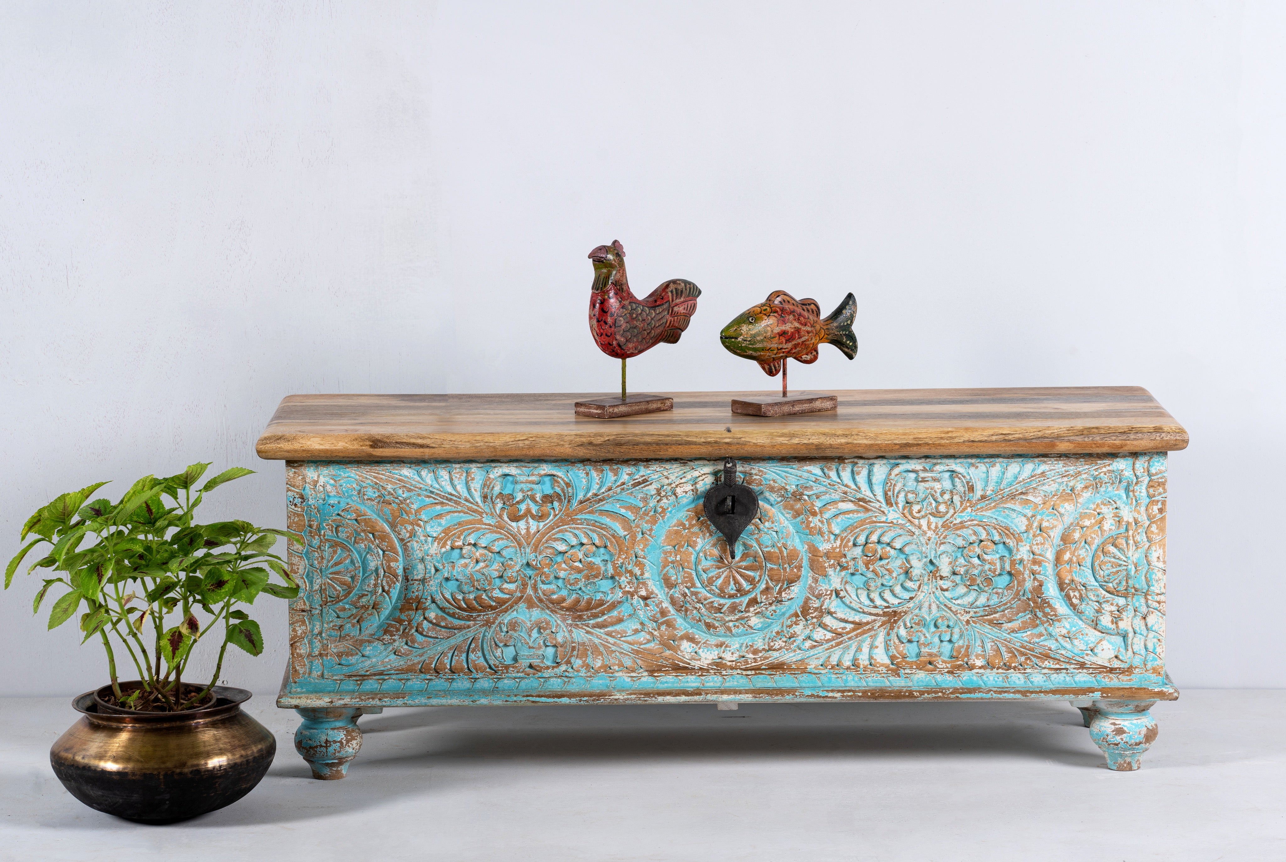 Hand-carved mango wood chest in blue with natural wood top – carved wooden furniture and wooden storage chest for eclectic or boho interiors.