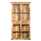 White background image of a handcrafted mango wood bookshelf with carved detailing – mango wood shelving and carved wooden furniture in a warm brown finish for timeless interiors.