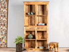 Handcrafted mango wood bookshelf with carved detailing – mango wood shelving and carved wooden furniture in a warm brown finish for timeless interiors.