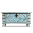White background image of a blue hand-carved mango wood chest with floral and geometric carvings – wood chest box perfect for boho style storage or decorative accent.