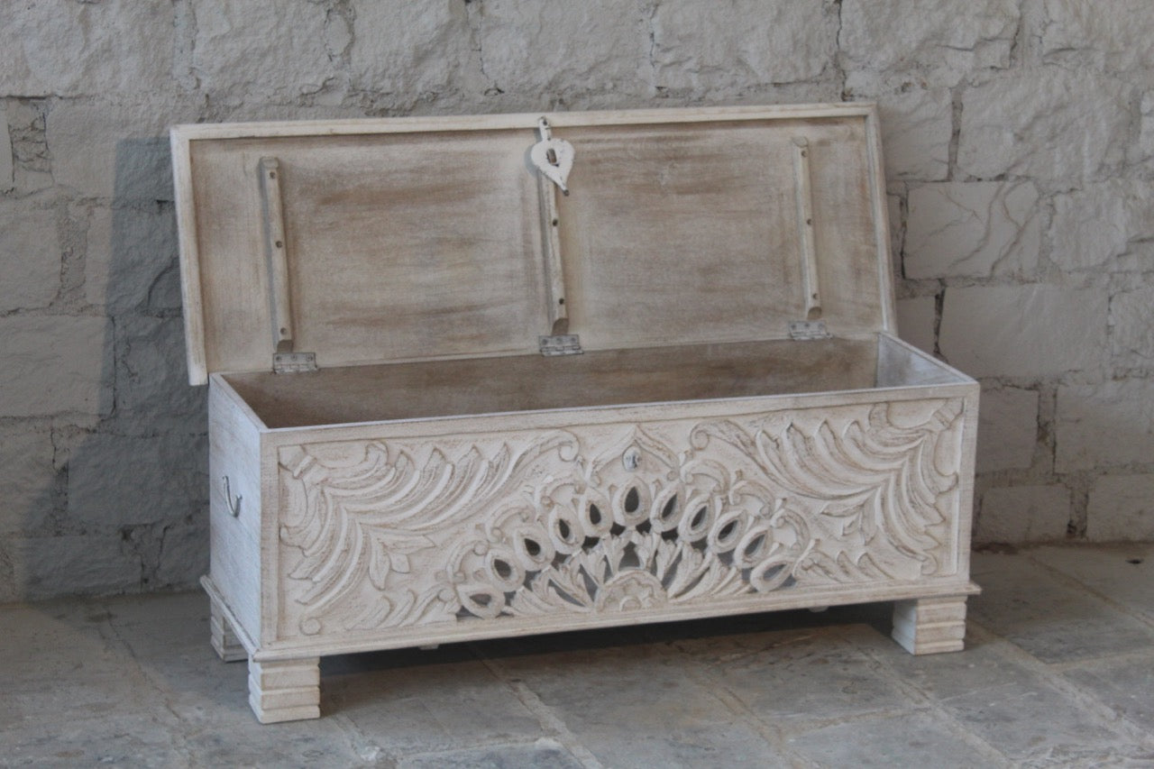 Image with open lid of a Hand-carved mango wood vintage chest with floral detailing – a one-of-a-kind mango wood chest ideal for Mediterranean-inspired interiors.